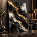 Black and Gold Abstract Metal Wall Art displayed in a styled interior